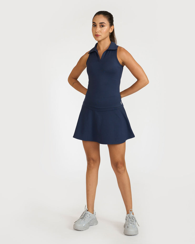 Hunnit Zen Polo Neck Top with In-built sports bra & Cheerful Skorts Co-Ord Set Zen Polo Neck Top with Built-in sports bra & Zen Cheerful Skorts Co-Ord Set