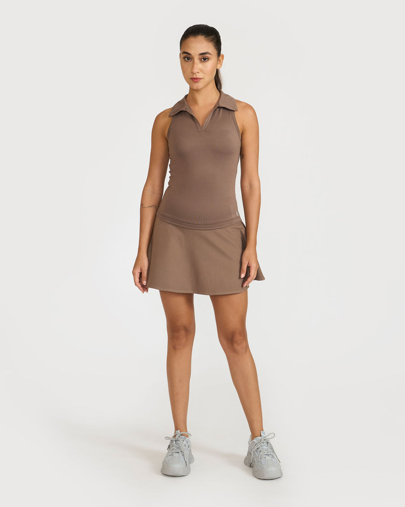 Hunnit Zen Polo Neck Top with Built-in sports bra & Zen Cheerful Skorts Co-Ord Set 